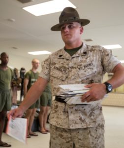 The senior drill instructor distributes mail to his recruits at the end of the training day. Mail is distributed at the end of each training day Monday through Saturday. (Photo by Cpl. David Bessey)